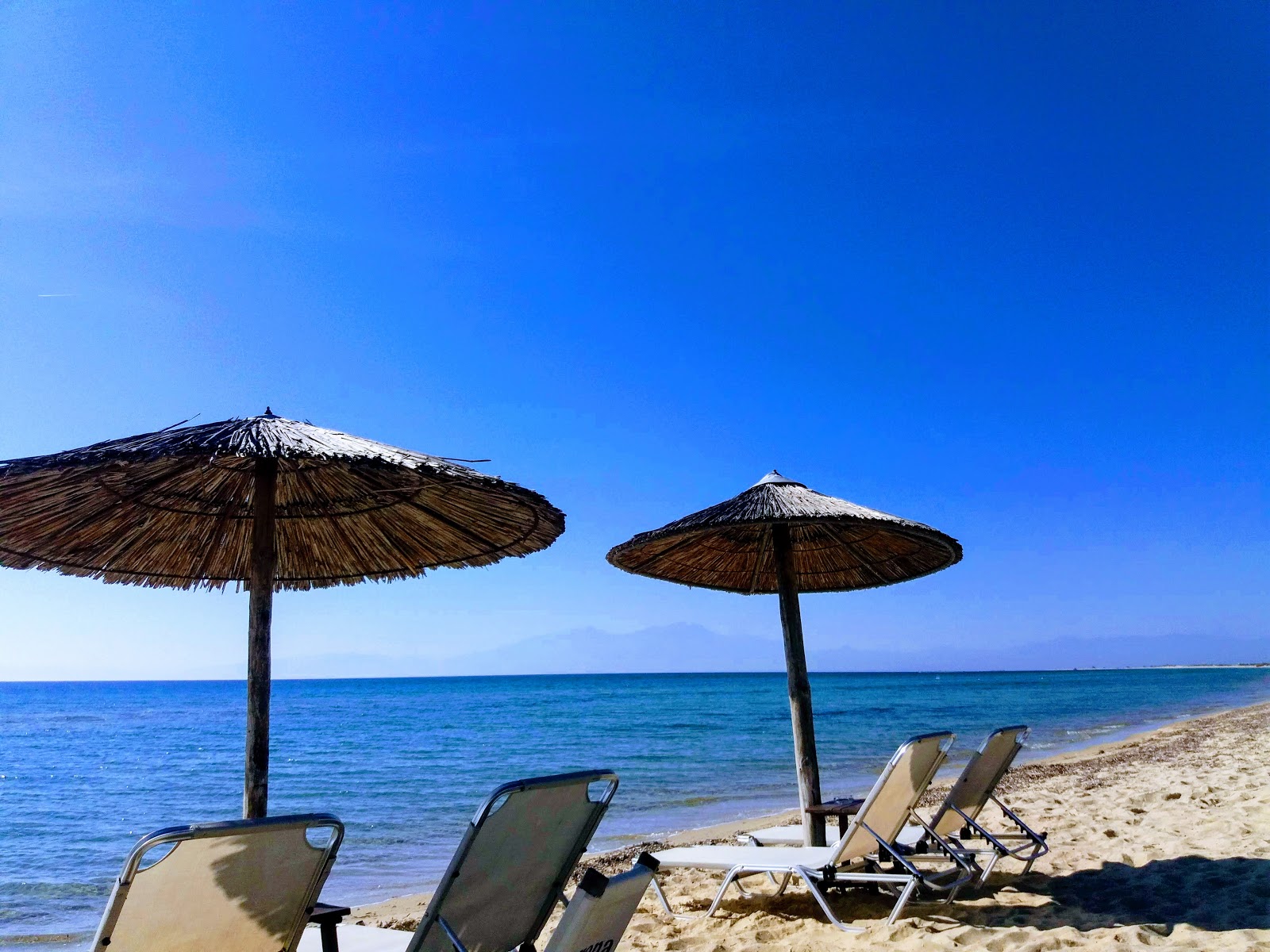 Photo of Epanomis River beach and the settlement