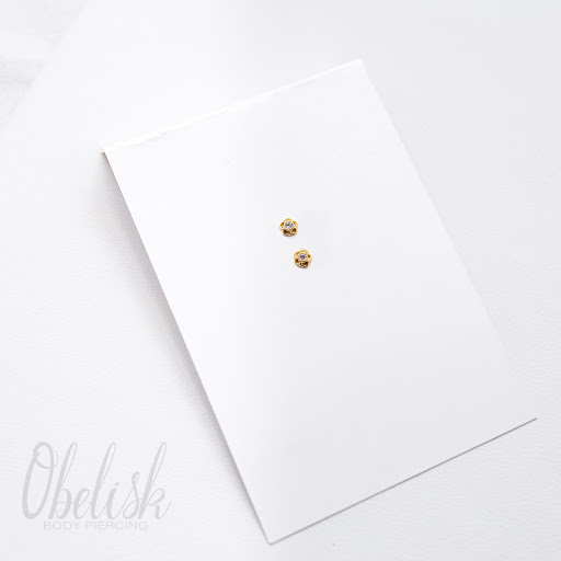 Explore thigh flower tattoo ideas, creative tattoo ideas in Renton, available at Obelisk Body Piercing & Fine Jewelry