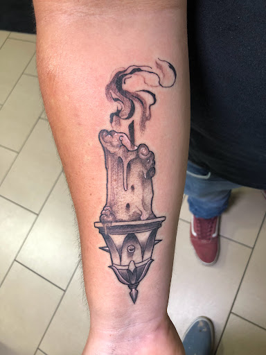 Explore half sleeve tattoo ideas for women, creative tattoo ideas in Sarasota, available at SEVEN SINS Tattoo Studio