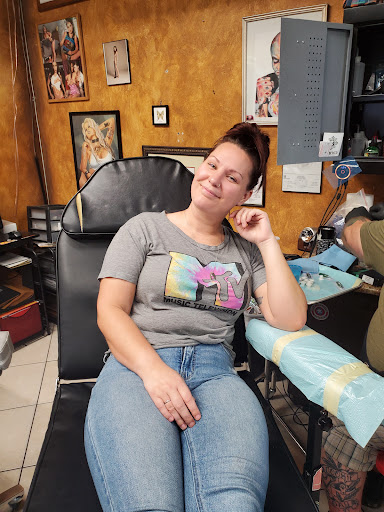 Explore frozen tattoo ideas, creative tattoo ideas in Orange City, available at Modern Elegance Tattoo & Body Piercing