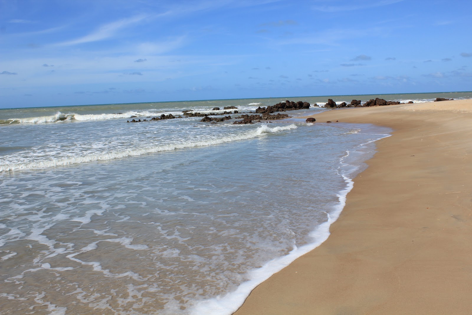 Fotografija Plaža Cajueiro in naselje