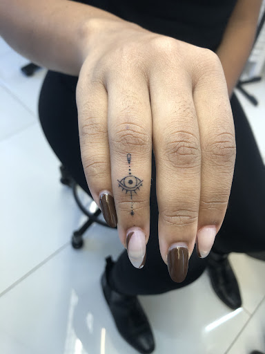 Explore functional tattoo ideas, creative tattoo ideas in Orange, available at Baron Art Tattoo