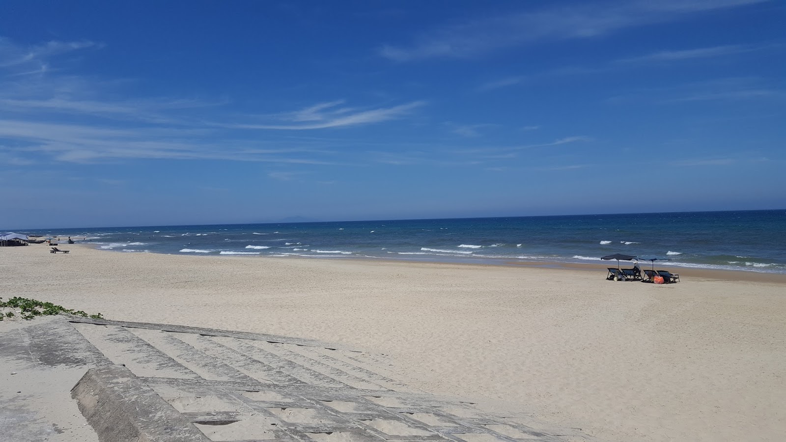 Foto van Binh Minh Beach met helder fijn zand oppervlakte