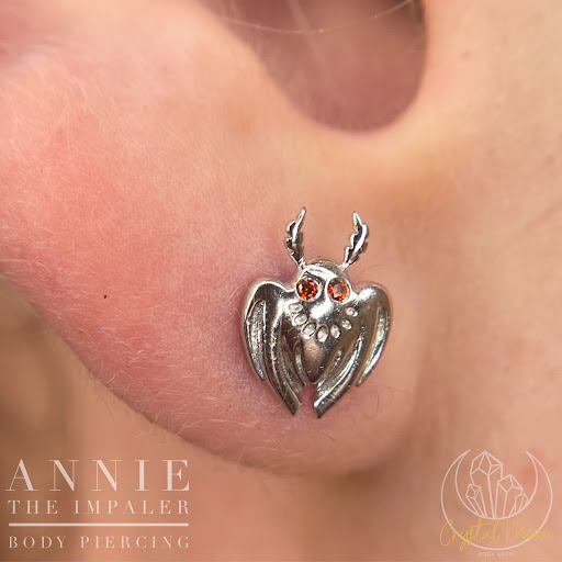 Find cool dog tattoo ideas for your next unique tattoo in Bloomington at Crystal Moon Body Arts