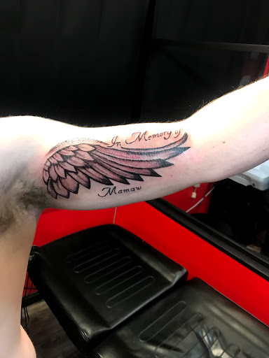 Explore yellow rose tattoo ideas, creative tattoo ideas in Lexington, available at LexInk Tattoo