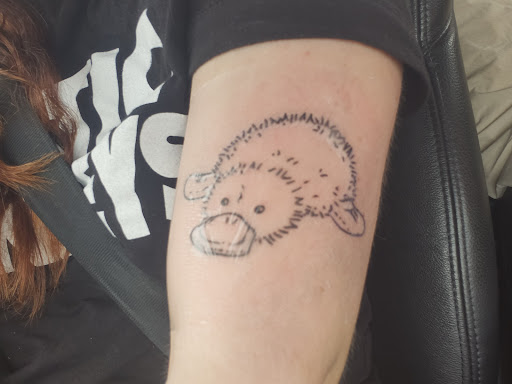 Explore mens ankle tattoo ideas, creative tattoo ideas in Minneapolis, available at Red Lotus Tattoo