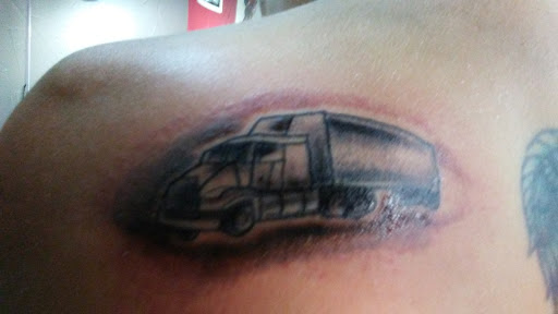 Explore cool dragon tattoo ideas, creative tattoo ideas in Rowlett, available at Fresh Image Tattoo Studios