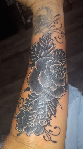 Explore outside forearm tattoo ideas, creative tattoo ideas in Spokane, available at All About It Tattoo Studio