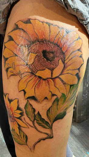 Explore dainty finger tattoo ideas, creative tattoo ideas in Madison, available at The Madison Tattoo Factory