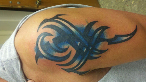 Explore filler sleeve tattoo ideas, creative tattoo ideas in Muncie, available at The Tattoo Studio