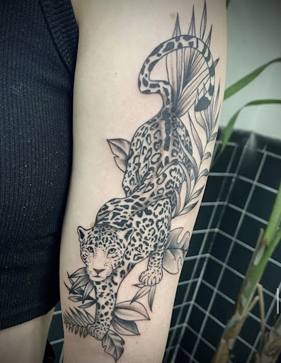 Explore roses tattoo ideas, creative tattoo ideas in New Orleans, available at TOUGH LOVE TATTOOS