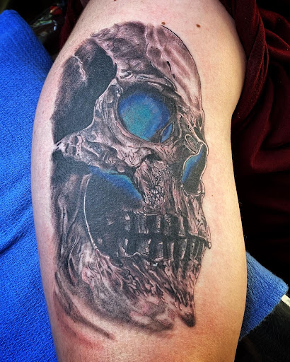 Find feminine skull tattoos ideas for your next unique tattoo in Moweaqua at Fleshwound Tattoo