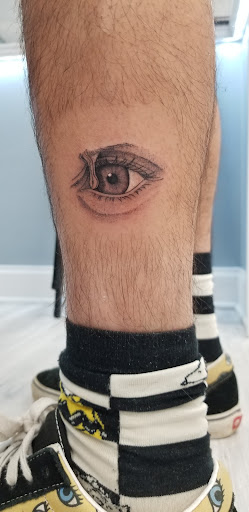 Explore tattoo ideas for domestic violence, creative tattoo ideas in Kansas City, available at SideQuest Collective Tattoo & Piercing