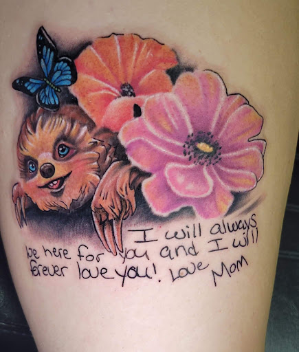 Explore cool chest tattoo ideas for guys, creative tattoo ideas in Angola, available at Hoodlum Ink