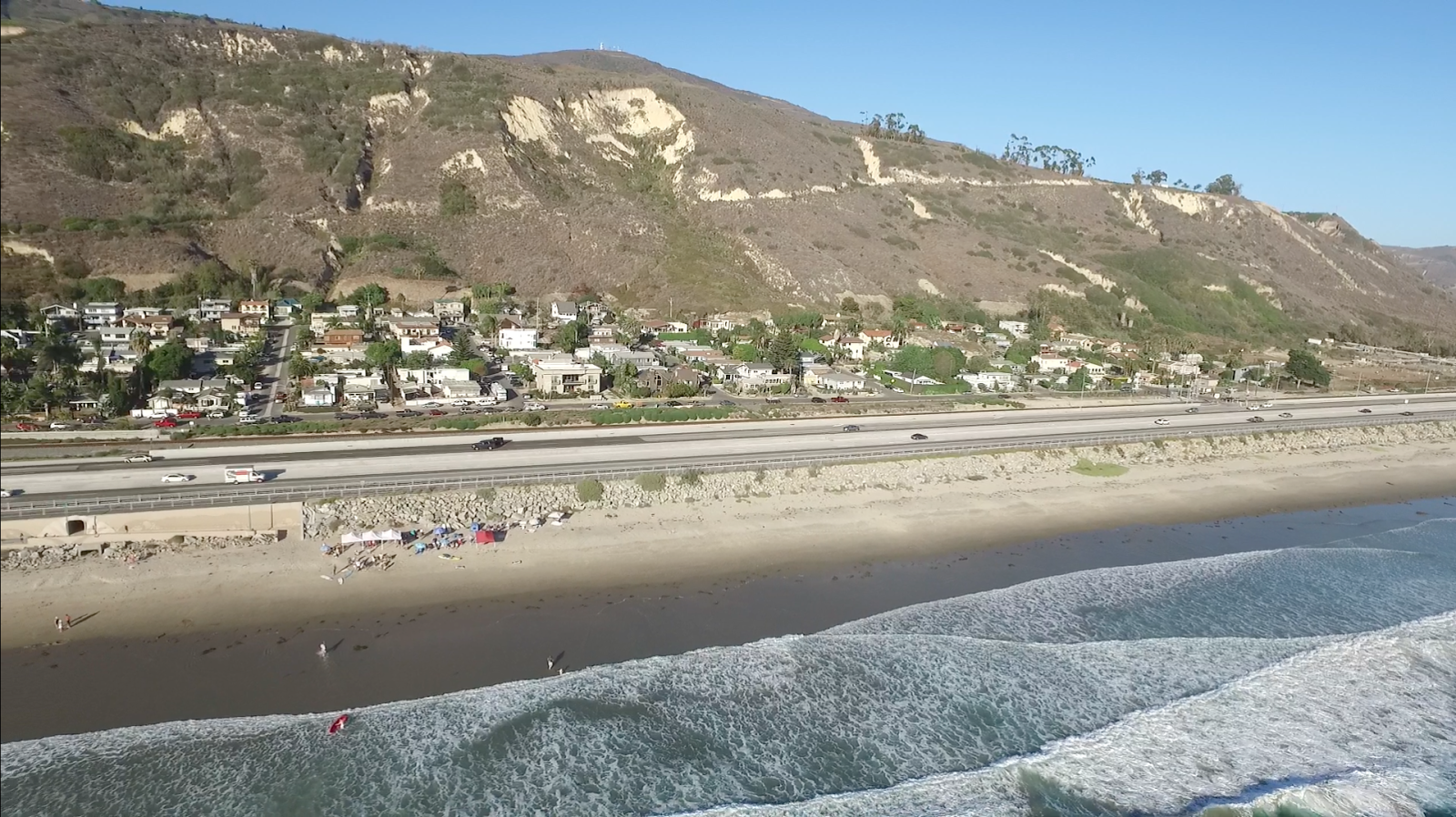 Photo of La Conchita Beach with turquoise water surface