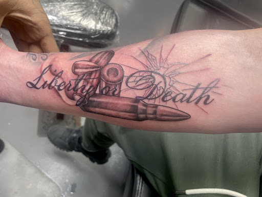 Explore leg tattoo idea for men, creative tattoo ideas in Meridian, available at Creative Pain Tattoo Studio