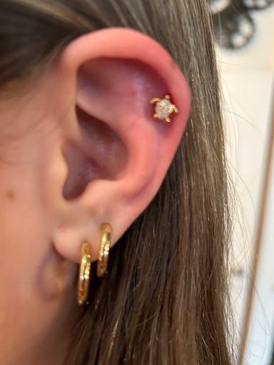 Explore small semicolon tattoo ideas, creative tattoo ideas in Beverly Hills, available at Karma Beverly Hills