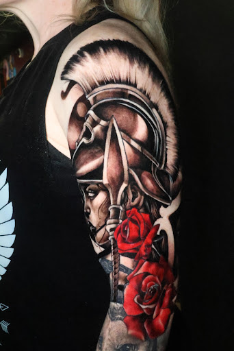 Explore painting tattoo ideas, creative tattoo ideas in Clarksville, available at Dark Raine Tattoo