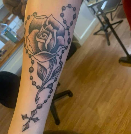 Explore dog print tattoo ideas, creative tattoo ideas in Stephenville, available at King of Hearts Tattoo (NO PIERCING)