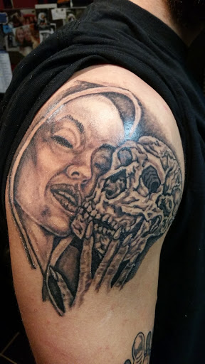 Find clock tattoo ideas for your next unique tattoo in Erie at EliKingInk