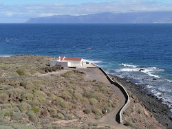 Photo de Playa del Cangrejo entouré de montagnes