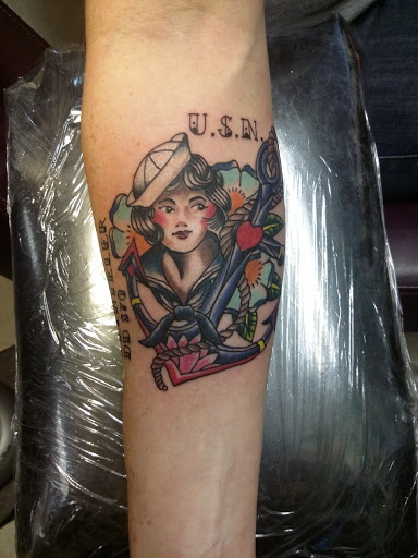 Explore tattoo sleeve filler ideas for a man, creative tattoo ideas in Fritch, available at Stars & Stripes Electric Tattoos