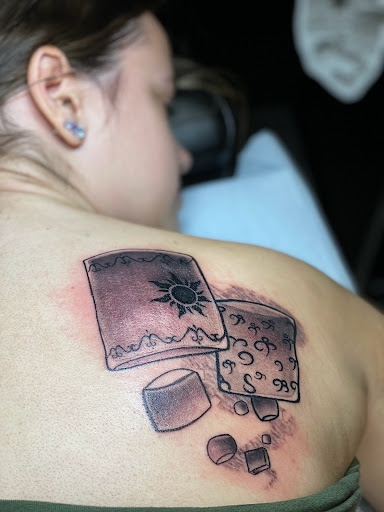 Explore arm tattoo ideas for females, creative tattoo ideas in Marietta, available at Sink or Swim Studio and Gallery