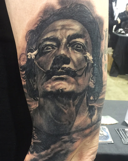 Explore girly half sleeve tattoo ideas for females, creative tattoo ideas in Columbus, available at Eternal Tattoo & Body Piercing - Columbus