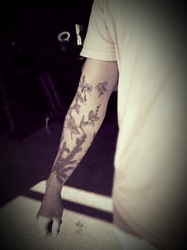 Explore mikasa tattoo ideas, creative tattoo ideas in Powell, available at Elysium Body Enhancements