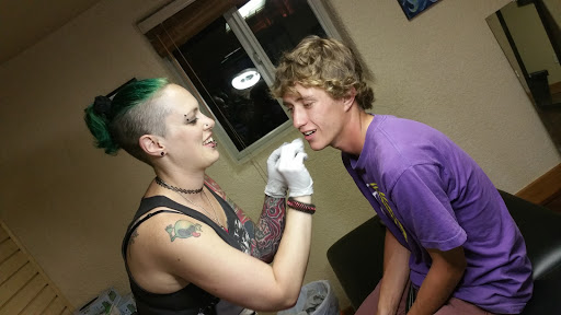 Explore tattoo ideas for happiness, creative tattoo ideas in Woodland Park, available at Above The Clouds Tattoo