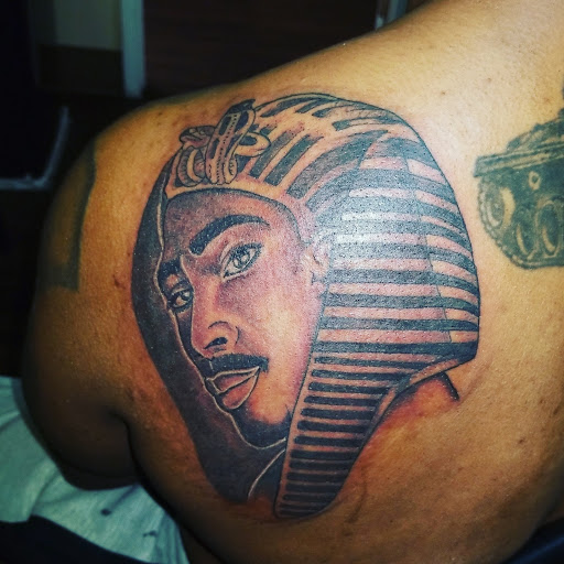 Explore invincible tattoo ideas, creative tattoo ideas in Sumter, available at LegendaryArt,LLC ,Tattoo Shop