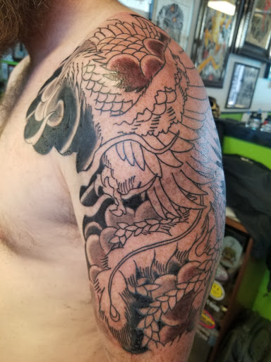 Explore tattoo cross ideas, creative tattoo ideas in Glendale, available at Double Down Tattoo and Body Piercing