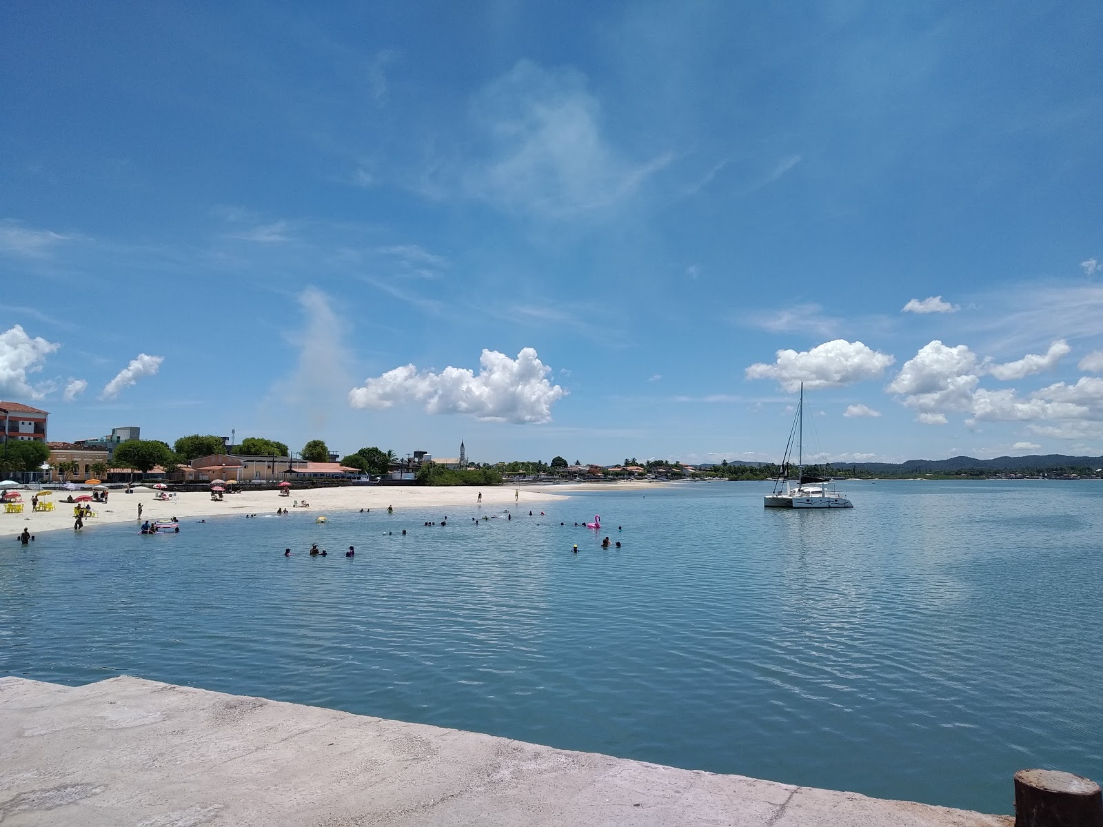 Foto van Praia Da Ponte en de nederzetting