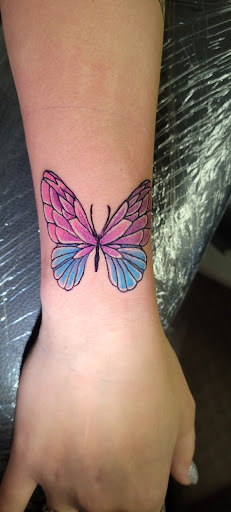 Explore annabelle tattoo ideas, creative tattoo ideas in Angola, available at Hoodlum Ink