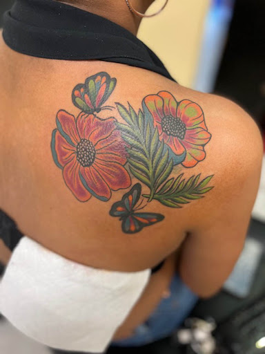 Explore cover up tattoo ideas for upper back, creative tattoo ideas in Kenner, available at Tattoology