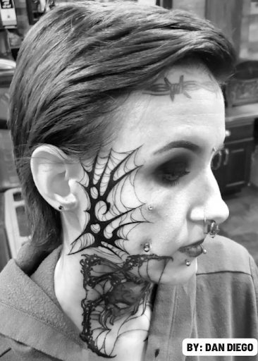 Explore long thin tattoo ideas, creative tattoo ideas in San Diego, available at The Chrome Lady Tattoo