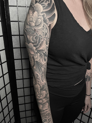 Explore adoption tattoos ideas, creative tattoo ideas in Edgewood, available at Wild Coyote Tattoo
