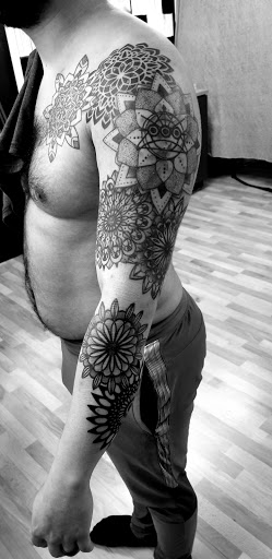 Explore lace tattoo ideas, creative tattoo ideas in Benton, available at Spectrum Tattoo