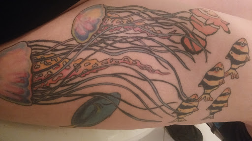 Explore cover up small tattoo ideas, creative tattoo ideas in Saint Augustine, available at Sailor Chers Tattoo & Body Piercing