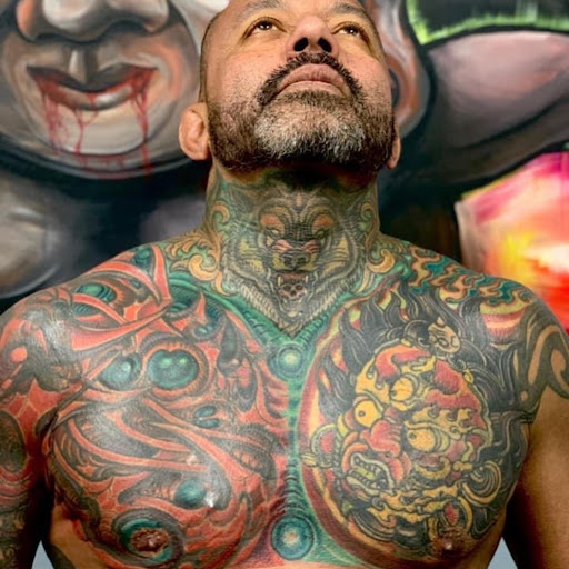 Explore mens upper arm tattoo ideas, creative tattoo ideas in Fresno, available at Red Wave Tattoo & Art Gallery