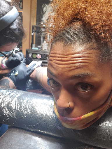Explore dart tattoo ideas, creative tattoo ideas in Huntsville, available at Art-I-Facts Tattoo Gallery