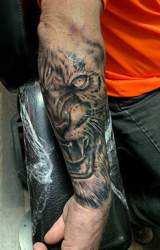 Explore mens outdoors tattoo ideas, creative tattoo ideas in Danville, available at Jasons Tattoo