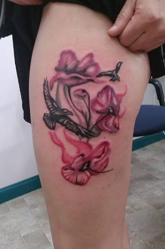 Explore back of arm tattoo ideas, creative tattoo ideas in Auburn, available at The Creative Edge Tattoo & Body Piercing