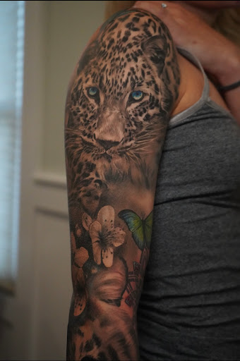 Explore tattoo face ideas, creative tattoo ideas in Farmingville, available at LizArt Ink tattoo