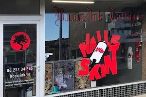 Boomink Tattoo’s walls and skin image
