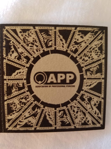 Explore cover up tattoo ideas for lower back, creative tattoo ideas in Charlotte, available at SADU Body Piercing & Modifications