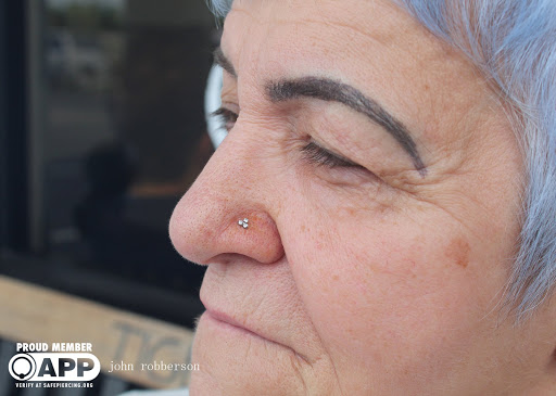 Explore tramp stamp tattoo cover up ideas, creative tattoo ideas in Fort Myers, available at Tiger Lotus Tattoo and Piercing