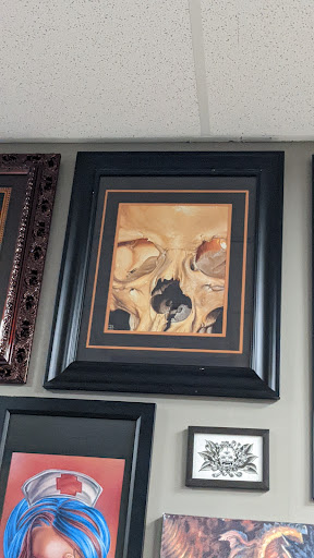 Explore cover up tattoo ideas for men, creative tattoo ideas in Springfield, available at Newage Tattoos and Body Piercings