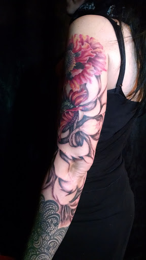 Explore september birth flower tattoo ideas, creative tattoo ideas in Greenfield, available at Pygmalions Tattoo