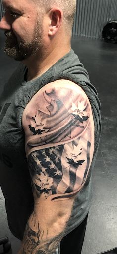 Explore tramp stamp tattoo ideas, creative tattoo ideas in Middletown, available at Traditionally Twisted Tattoo